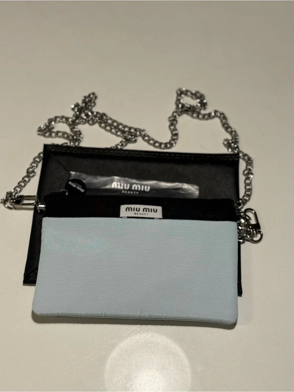 Miu Miu Black and Light Blue Chain Crossbody Pouch